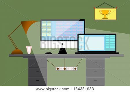 Workplace in office. Computer mono block and a laptop on the table