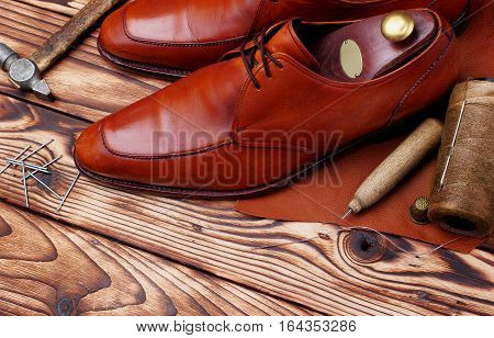 Fashion Derby Shoes Handmade And Shoemaker Tools Awl, Nails, Skien Of Thread .wooden Background.copy