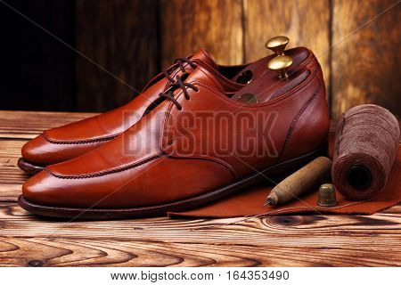 Fashion Shoes Handmade And Shoemaker Tools Awl, Nails, Skien Of Thread .wooden Background.concept Co