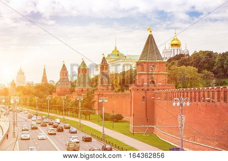 Traffic on the Kremlyovskaya embankment in Moscow with sunlight effect