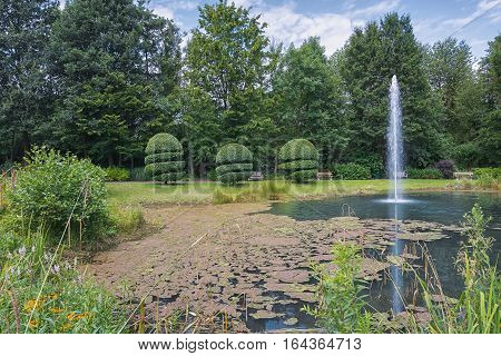 Landgraaf, Netherlands - July 12, 2016: English garden style park Mondo Verde Netherlands.
