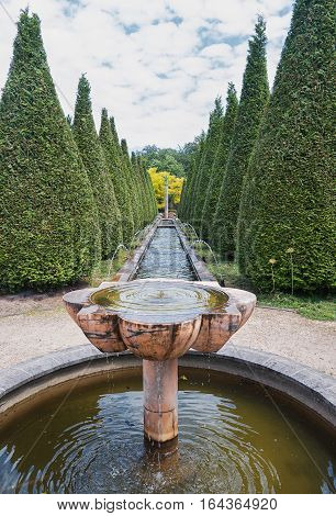 Landgraaf, Netherlands - July 12, 2016: A view of the number of fountains inside pyramidal tui in the park Mondo Verde Netherlands.