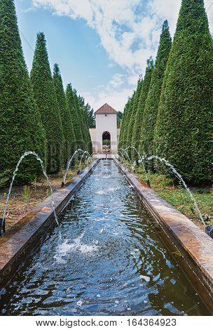 Landgraaf, Netherlands - July 12, 2016: A view of the number of fountains inside pyramidal tui in the park Mondo Verde Netherlands.