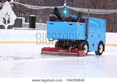 special machine ice harvester cleans the ice rink