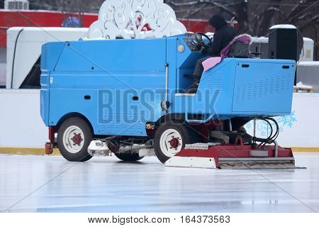 special machine ice harvester cleans the ice rink