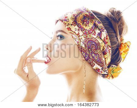 young pretty modern girl with bright shawl on head emotional posing isolated on white background, asian people ethnicity