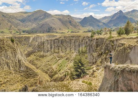 LATACUNGA, ECUADOR, FEBRAURY - 2016 - Countryside scene of valley surrounded by andes range mountains in Latacunga district Ecuador South America