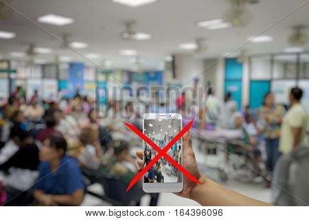 No photography allowed in hospitals, smartphone no camera hospital, blurred background