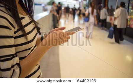 The Social Network Women play smart phones Department store