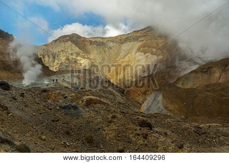Climbing to the active volcano Mutnovsky on Kamchatka.