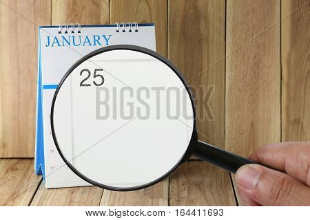 Magnifying Glass In Hand On Calendar You Can Look Twenty Five Day Of Monthfocus Number Twenty Five I