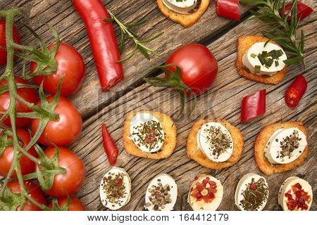 crunchy baguette slices with cream cheese and herbs