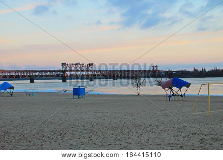 Bridge across river Dnieper at sunset in Kremenchug Ukraine