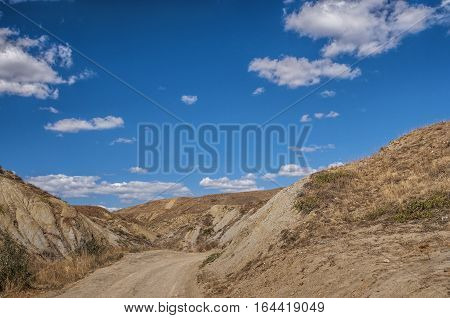 Russia, peninsula of Crimea, near Sudak. Tract Kapsel - scorched southern sun endless hills.