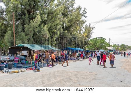 JACOBSDAL SOUTH AFRICA - DECEMBER 24 2016: Unidentified shoppers at an informal street market in Jacobsdal a small town in the Free State Province.