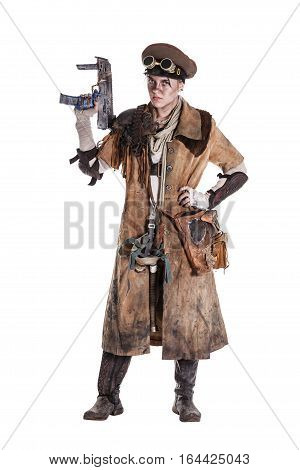 Nuclear post apocalypse life after doomsday concept. Grimy female survivor with homemade weapons. Studio closeup portrait on white background