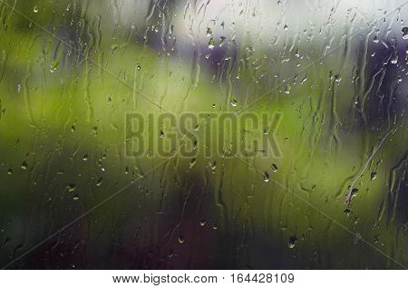 Water drops on window - splattered glass - abstract background