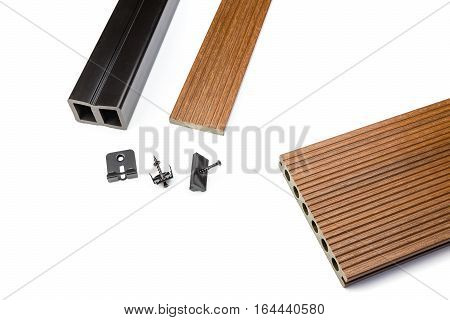 Brown composite decking plank with fastening material on white background