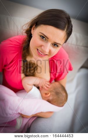 Mother Feeding Baby