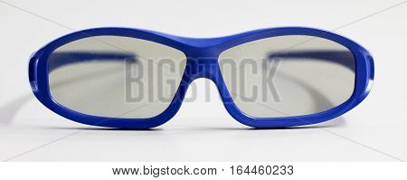 Pair of blue lasses for three dimensional movies.