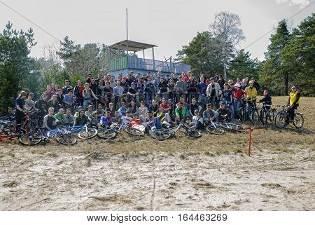 Tyumen, Russia - April 22, 2007: First festival of cyclists Samogon. Participants pose on a glade