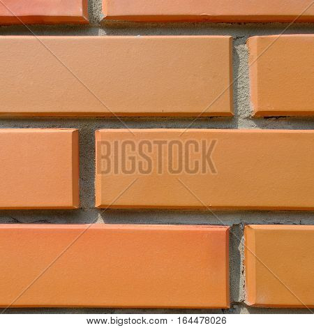 Detail of the house wall. Background of facing bricks
