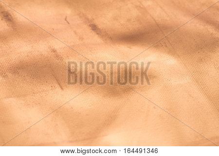 Gold texture with kinks and scratches abstract background. Golden background