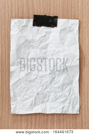 Note paper crumpled of empty and copy space on wooden backgroundYou can input the message text in picture.