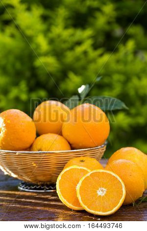 Sweet Fresh Oranges In Natural Light On Old Wood