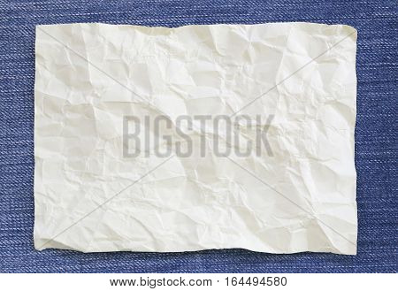 Note paper crumpled of empty and copy space on Denim backgroundYou can input the message text in picture.