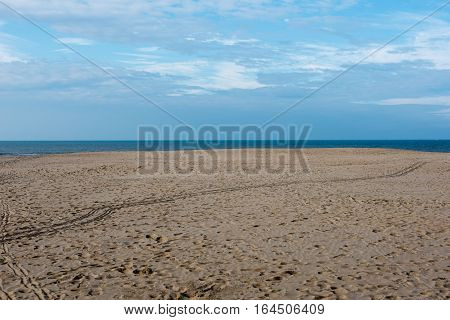 Beach with footprints at the North Sea in Koksijde Belgium