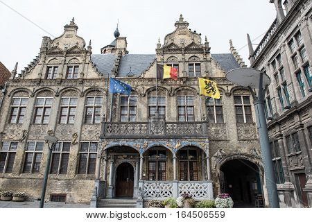 Historic town hall with flags and gold jewelery in Voerne Belgium