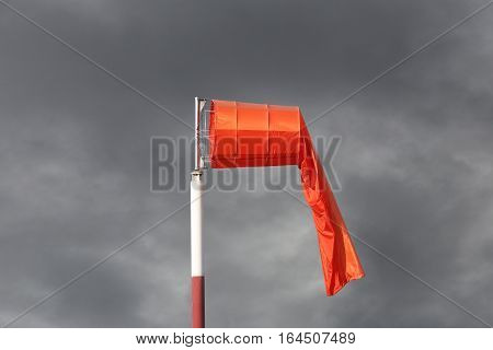 Wind sock of equipment check the wind blow direction in day time and no wind blow on overcast sky cloudy.