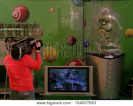 BUCHAREST ROMANIA - December 30 2015: Image of lottery balls during extraction of the winning numbers before the New Year.