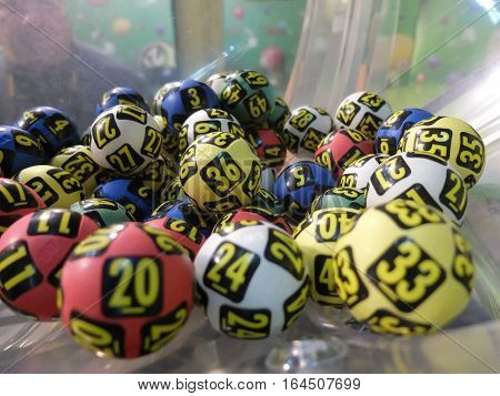 BUCHAREST ROMANIA - December 30 2015: Image of lottery balls during extraction of the winning numbers before the New Year.