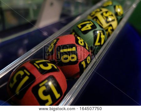BUCHAREST ROMANIA - December 30 2015: Image of lottery balls during extraction of the winning numbers before the New Year.