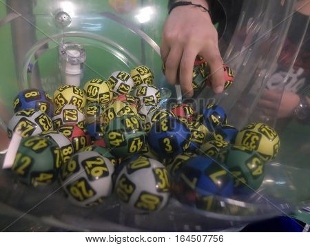 BUCHAREST ROMANIA - December 30 2015: Image of lottery balls during extraction of the winning numbers before the New Year.