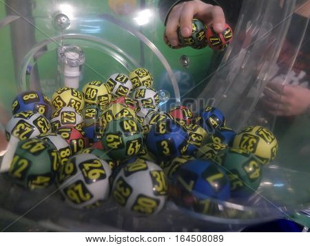 BUCHAREST ROMANIA - December 30 2015: Image of lottery balls during extraction of the winning numbers before the New Year.