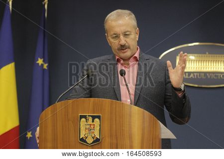 Bucharest Romania 5 December 2015: Romanian Vice Prime Minister and Minister of Regional Development and Public Administration Vasile Dincu speaks during a press conference at Bucharest Headquarters.