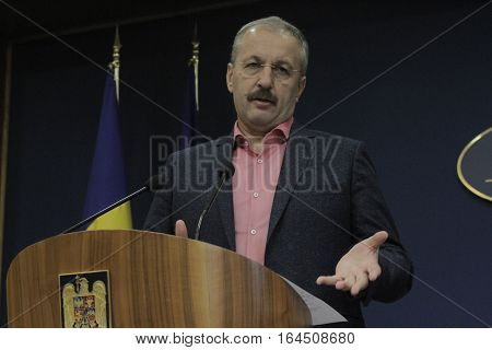 Bucharest Romania 5 December 2015: Romanian Vice Prime Minister and Minister of Regional Development and Public Administration Vasile Dincu speaks during a press conference at Bucharest Headquarters.