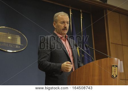 Bucharest Romania 5 December 2015: Romanian Vice Prime Minister and Minister of Regional Development and Public Administration Vasile Dincu speaks during a press conference at Bucharest Headquarters.