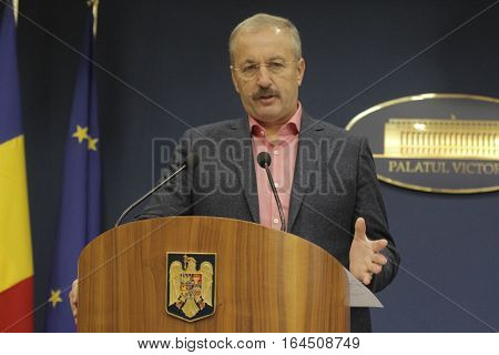 Bucharest Romania 5 December 2015: Romanian Vice Prime Minister and Minister of Regional Development and Public Administration Vasile Dincu speaks during a press conference at Bucharest Headquarters.