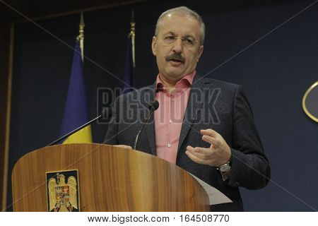 Bucharest Romania 5 December 2015: Romanian Vice Prime Minister and Minister of Regional Development and Public Administration Vasile Dincu speaks during a press conference at Bucharest Headquarters.