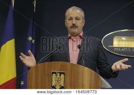 Bucharest Romania 5 December 2015: Romanian Vice Prime Minister and Minister of Regional Development and Public Administration Vasile Dincu speaks during a press conference at Bucharest Headquarters.