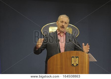 Bucharest Romania 5 December 2015: Romanian Vice Prime Minister and Minister of Regional Development and Public Administration Vasile Dincu speaks during a press conference at Bucharest Headquarters.