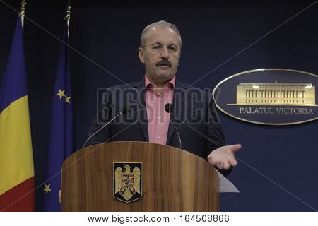 Bucharest Romania 5 December 2015: Romanian Vice Prime Minister and Minister of Regional Development and Public Administration Vasile Dincu speaks during a press conference at Bucharest Headquarters.