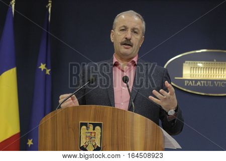 Bucharest Romania 5 December 2015: Romanian Vice Prime Minister and Minister of Regional Development and Public Administration Vasile Dincu speaks during a press conference at Bucharest Headquarters.