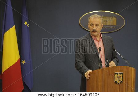 Bucharest Romania 5 December 2015: Romanian Vice Prime Minister and Minister of Regional Development and Public Administration Vasile Dincu speaks during a press conference at Bucharest Headquarters.