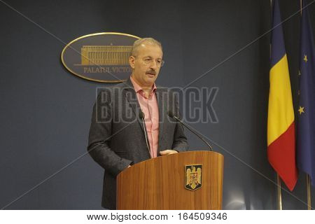 Bucharest Romania 5 December 2015: Romanian Vice Prime Minister and Minister of Regional Development and Public Administration Vasile Dincu speaks during a press conference at Bucharest Headquarters.