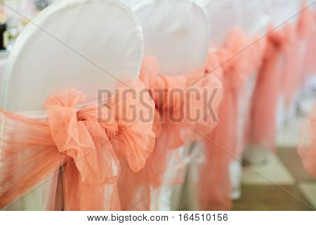 Banquet wedding chairs setting on evening reception awaiting guests